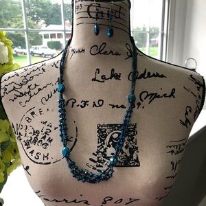 Beaded necklace and earrings.